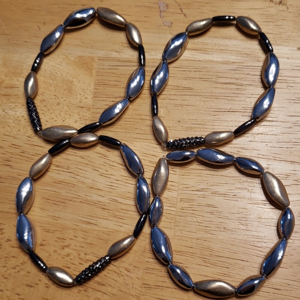 Silver gold and grey bracelets